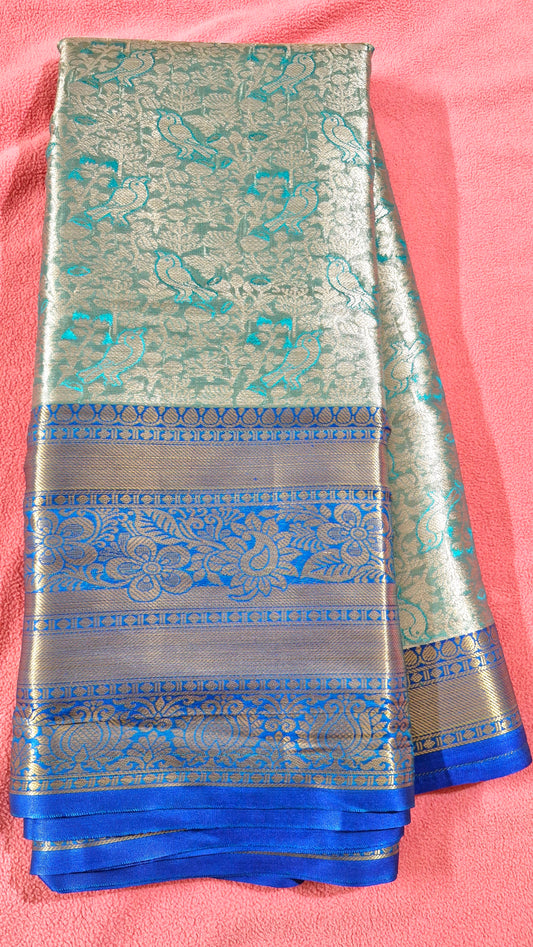 TURQUOISE GREEN TISSUE SILK SAREE
